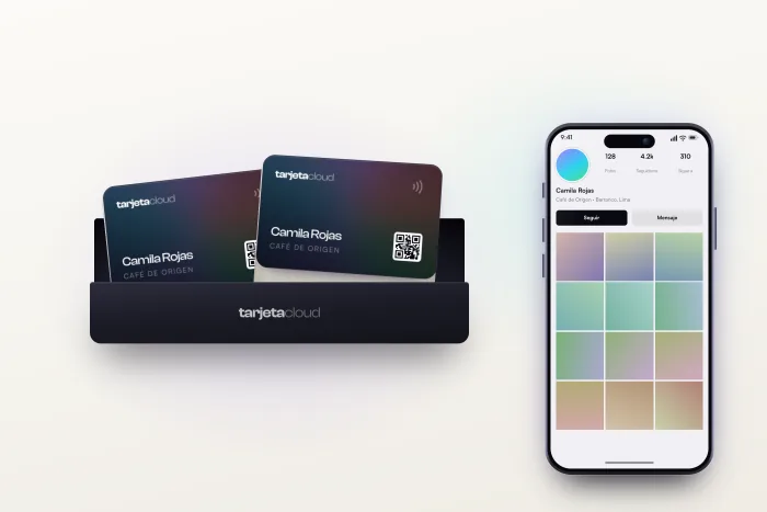 Una caja de tarjetas NFC llena, junto a un celular con un perfil de Instagram abierto